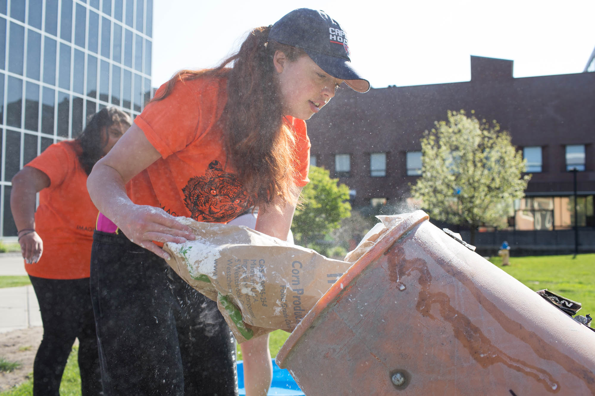 Corry Straathof, a 3rd year Mechanical Engineering major sets up an Oobleck during Imagine RIT: Innovation and Creativity Festival on the Rochester Institute of Technology campus in Rochester, N.Y., May 7, 2016. (Photo by Emily Hunt) #imaginerit #ritpj