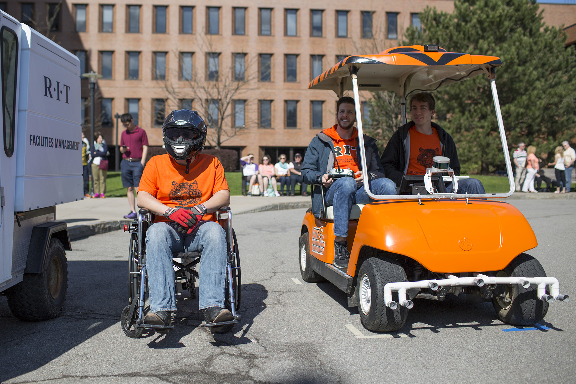 Nick Brown, a third year mechanical engineering student  sits on his motorized wheelchair during Imagine RIT: Innovation and Creativity Festival on the Rochester Institute of Technology campus in Rochester, N.Y., May 7, 2016.  (Photo by Tom Brenner.)   #imaginerit #ritpj