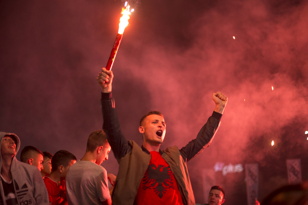 Denis Bardhi, 16, celebrates after their country won the Group A match against Romania in Tirana, Albania on Sunday June 19, 2016. Albania defeated Romania 1-0. 