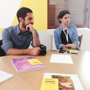 RIT-K students Lauren Peace (R), Daniel Vasta,  listen to Besa Luci, Editor in Chief of Kosovo 2.0 in downtown Prishtina on July 4, 2016. 