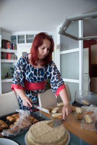 Kaltrina Zeka's mother begins to prepare the food for the main meal for the day. The women of the household begin these preparations while the men attend the morning prayer. 