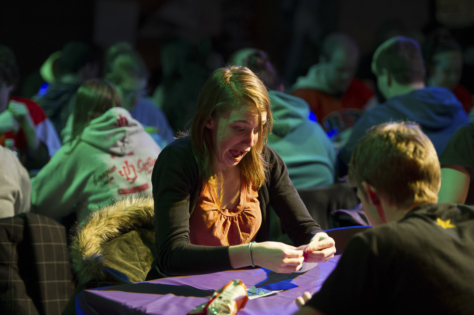 Erin Moore, a first year molecular bioscience and biotechnology major, reacts to a number on her bingo card being called during the Late Night Rock'n Bingo held during Rochester Insitute of Technology's Freezefest  on the University's campus in Henrietta, N.Y., on Friday Feb.1, 2013.