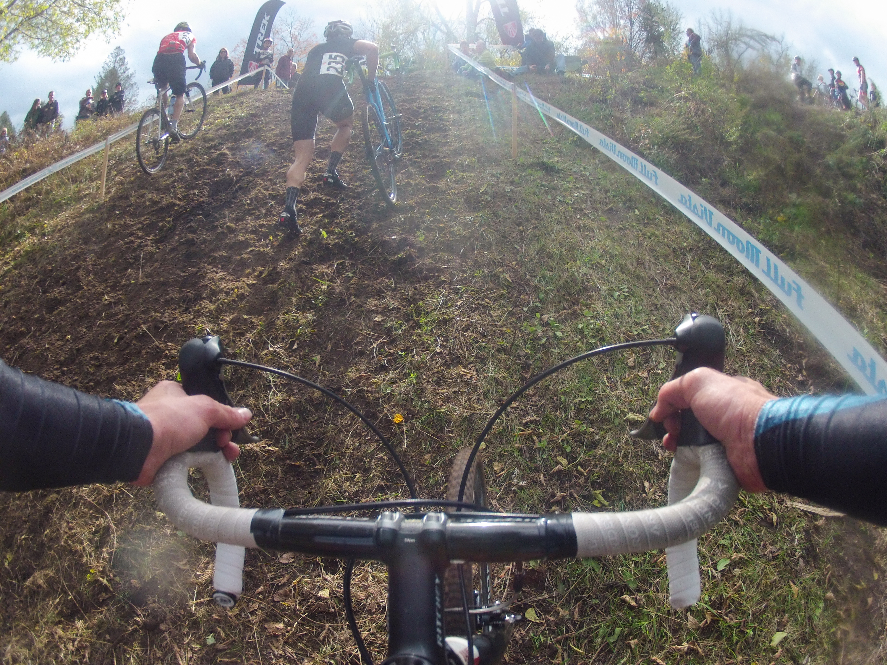 Corey Knowles competes in the Full Moon Vista Cyclocross bicycle race at Ellison Park in Rochester, NY, on Sunday, Oct. 20, 2013. "That could have gone better. On the first lap I kept running into the tape and taking out stakes," said Knowles. Photo by Rugile Kaladyte