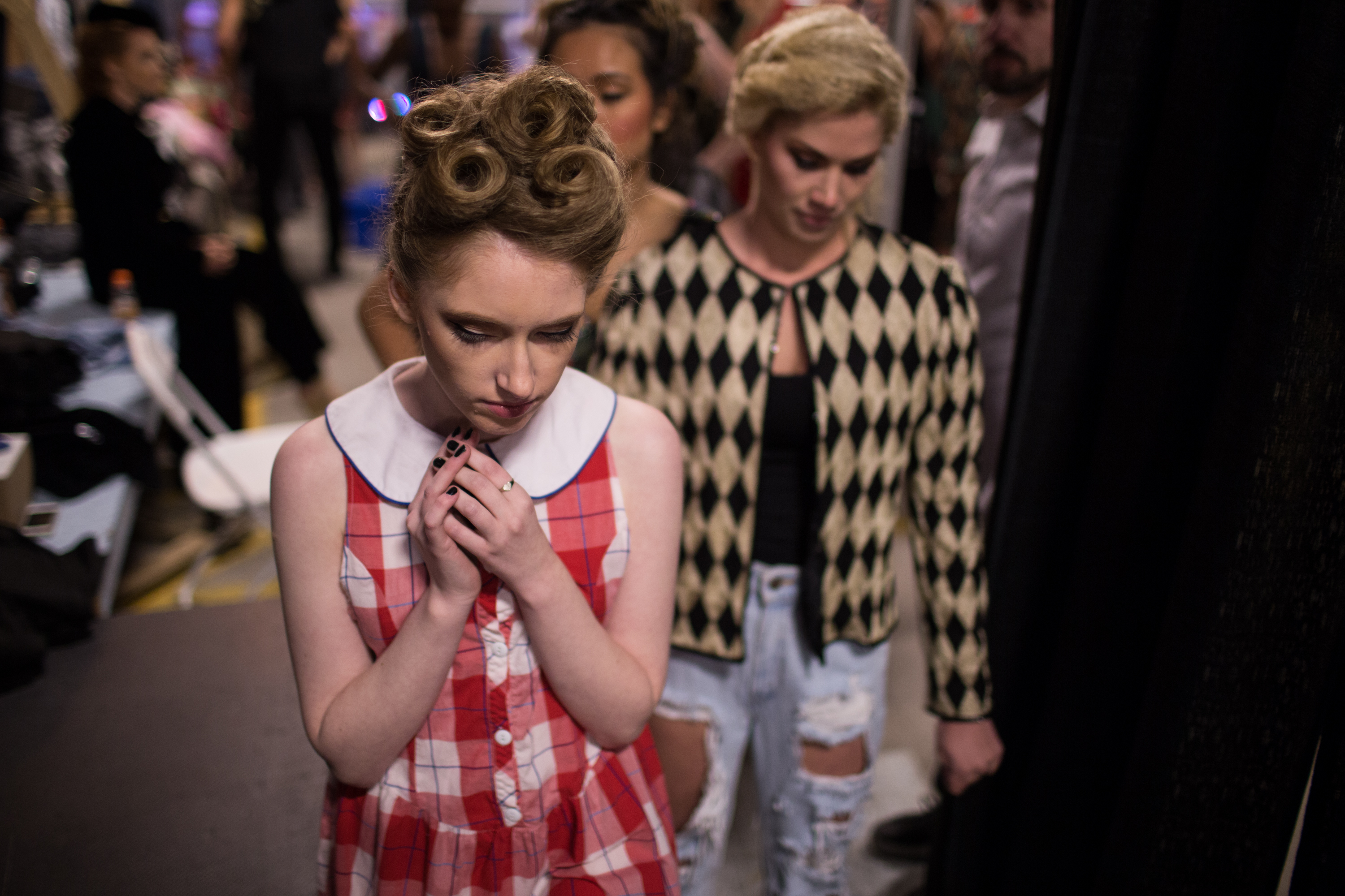 Maris Breaton waits for her turn to model in the From the Ground Fashion Show, on September 12, 2014 in Highland Falls Garage in Rocheste, N.Y.