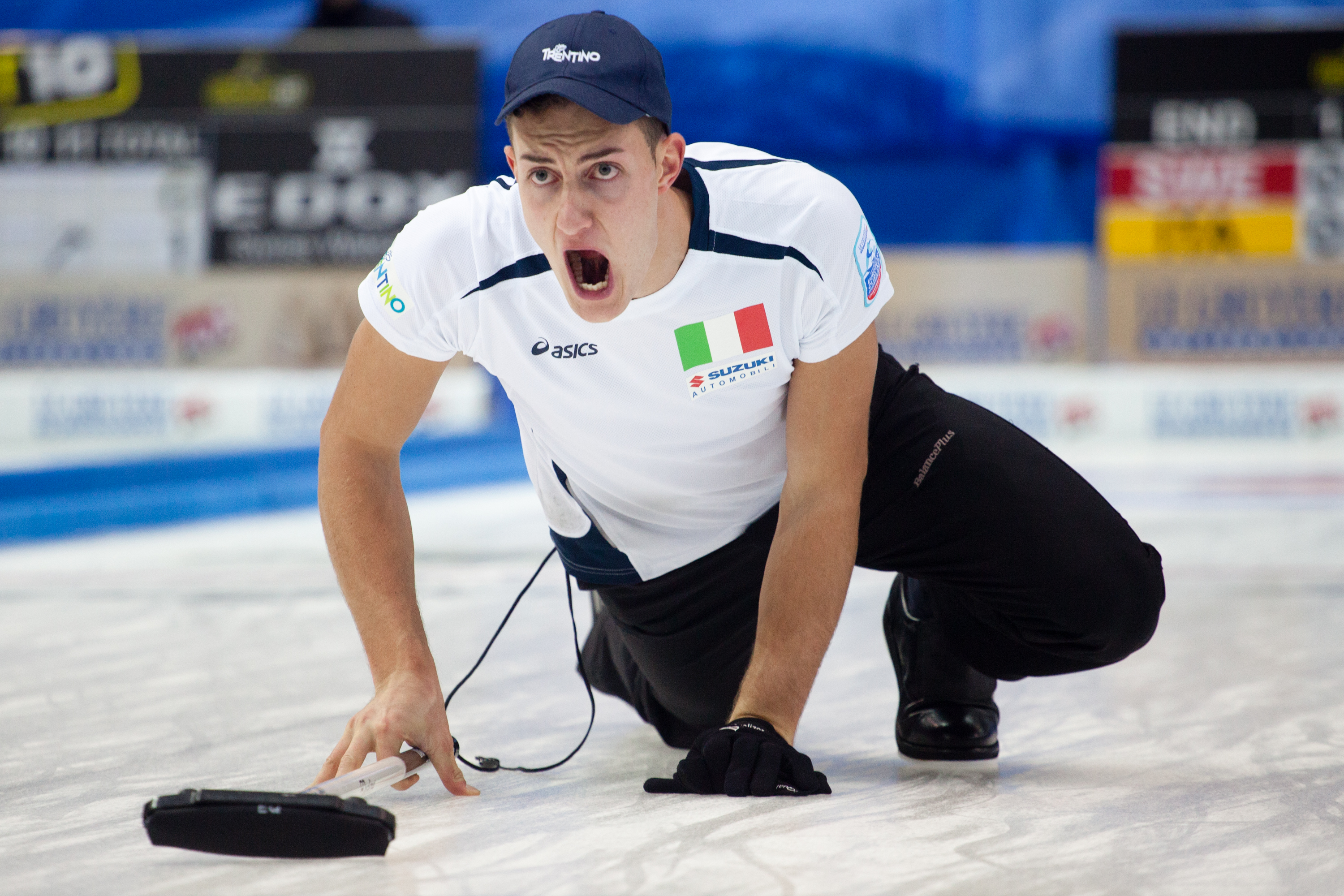 Amos Mosaner the Vice Skip for Italy yell at his team to sweep during the Le Gruyère European Curling Championships on 11/27/2014. Italy ended up in fourth place with a record of 7 and 4.