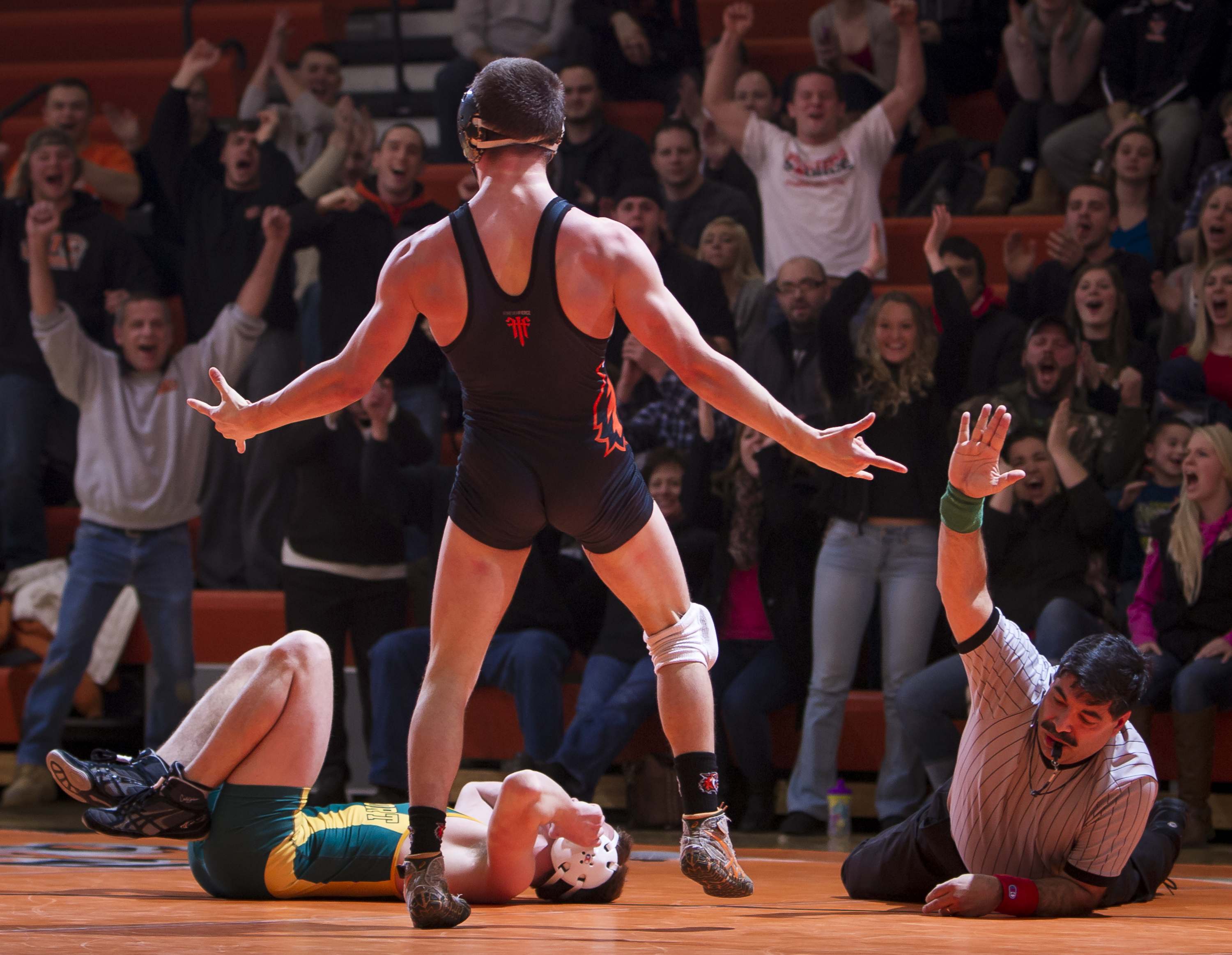 Brad Mayville, Rochester Institute of Technology, celebrates after winning the 149 pound bout by pin during senior night at RIT on Jan. 28, 2015. Mayville is a senior.