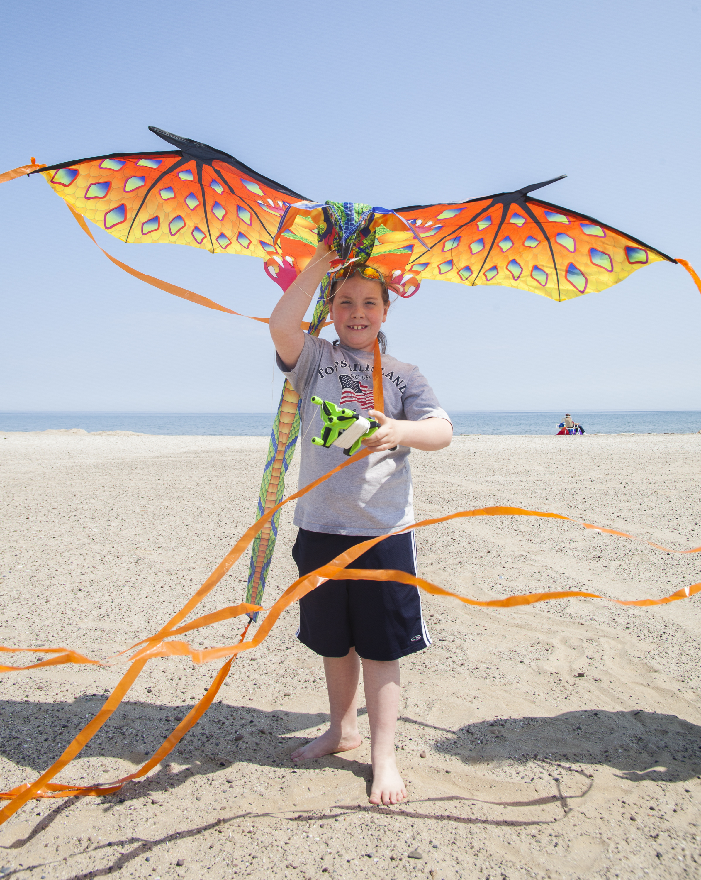 Ocean Hodziewich, 8, of Dansville, NY poses for a portrait with his dragon kite at Ontario Beach Park in Rochester, NY on Sunday, May 3, 2015. "They're fun to fly...I think I was 3 or 4 when I started."