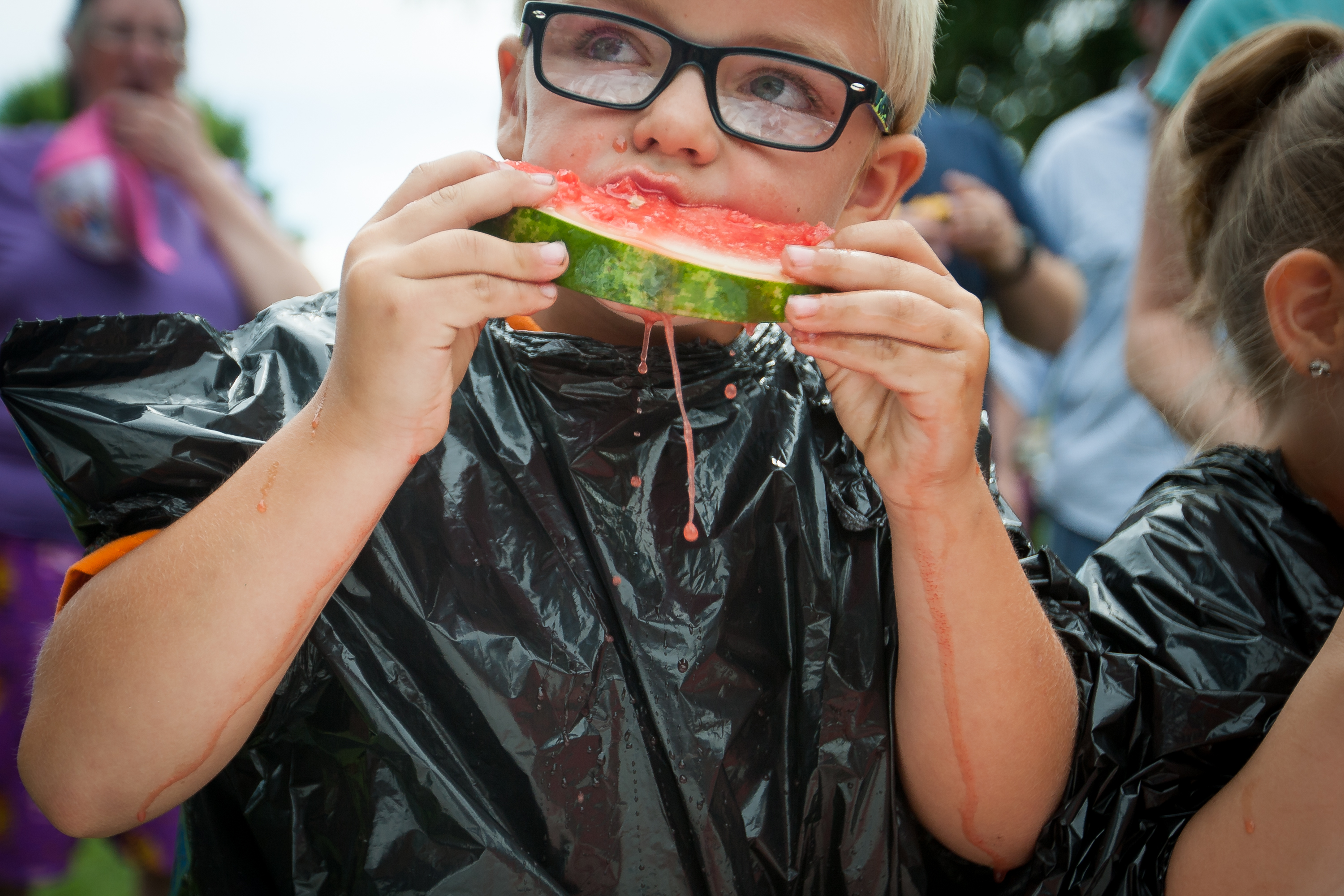 Ed Skarlem, 7, devours his watermelon piece in the watermelon-eating contest held in Larimore, N.D. as part of the Larimore Days celebration on July 16, 2016.