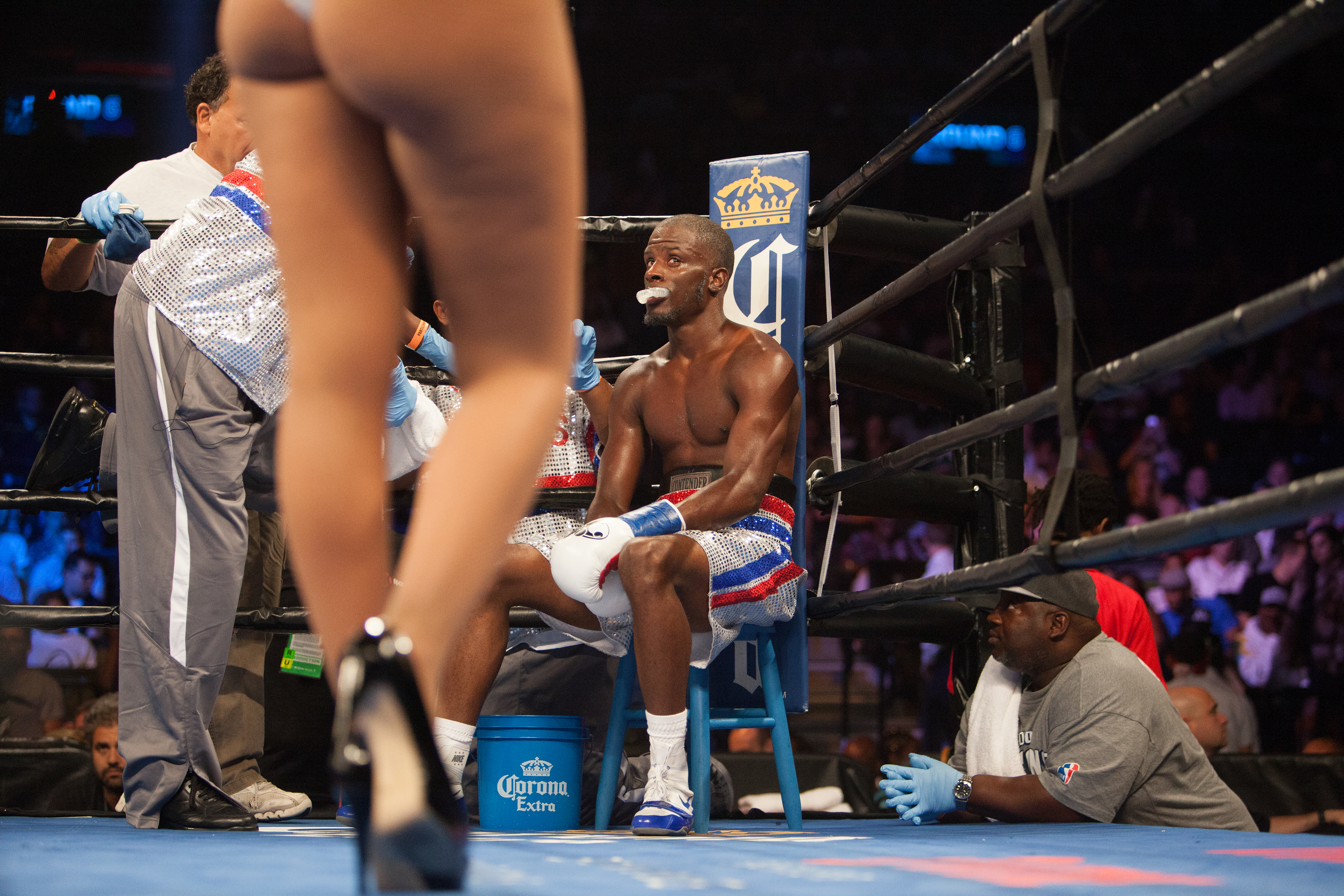 Tony Harrison looks on at the ring girl in between rounds at the Barclays Arena in Brooklyn, N.Y. on July 31, 2016.