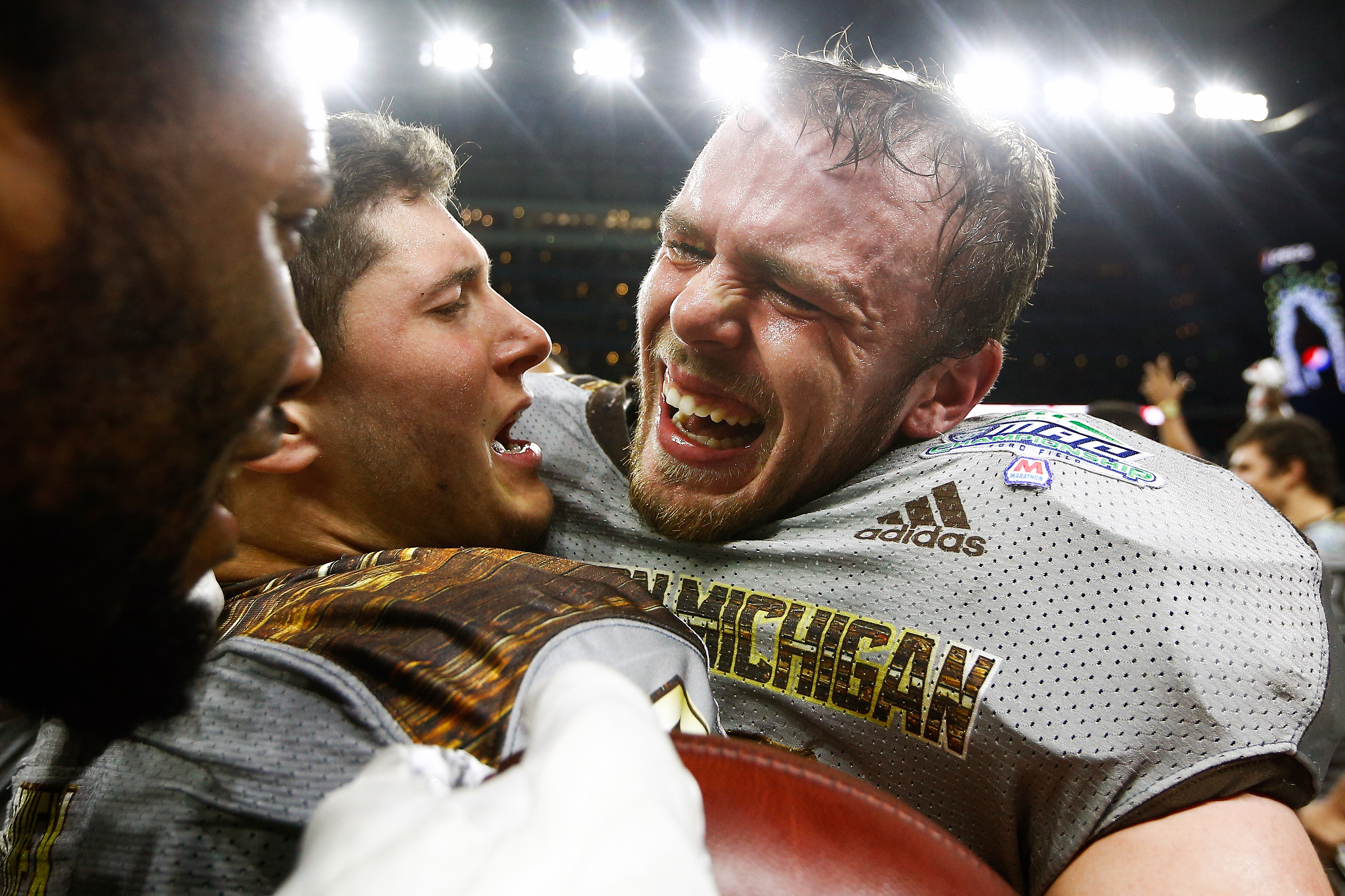 Western Michigan linebacker Robert Spillane (10) is greeted by teammates after a game winning interception  during the second half of the NCAA college football Mid-American Conference championship game against Ohio at Ford Field in Detroit, Friday, Dec. 2, 2016. WMU defeated Ohio 29-23 and is 13-0 on the season.