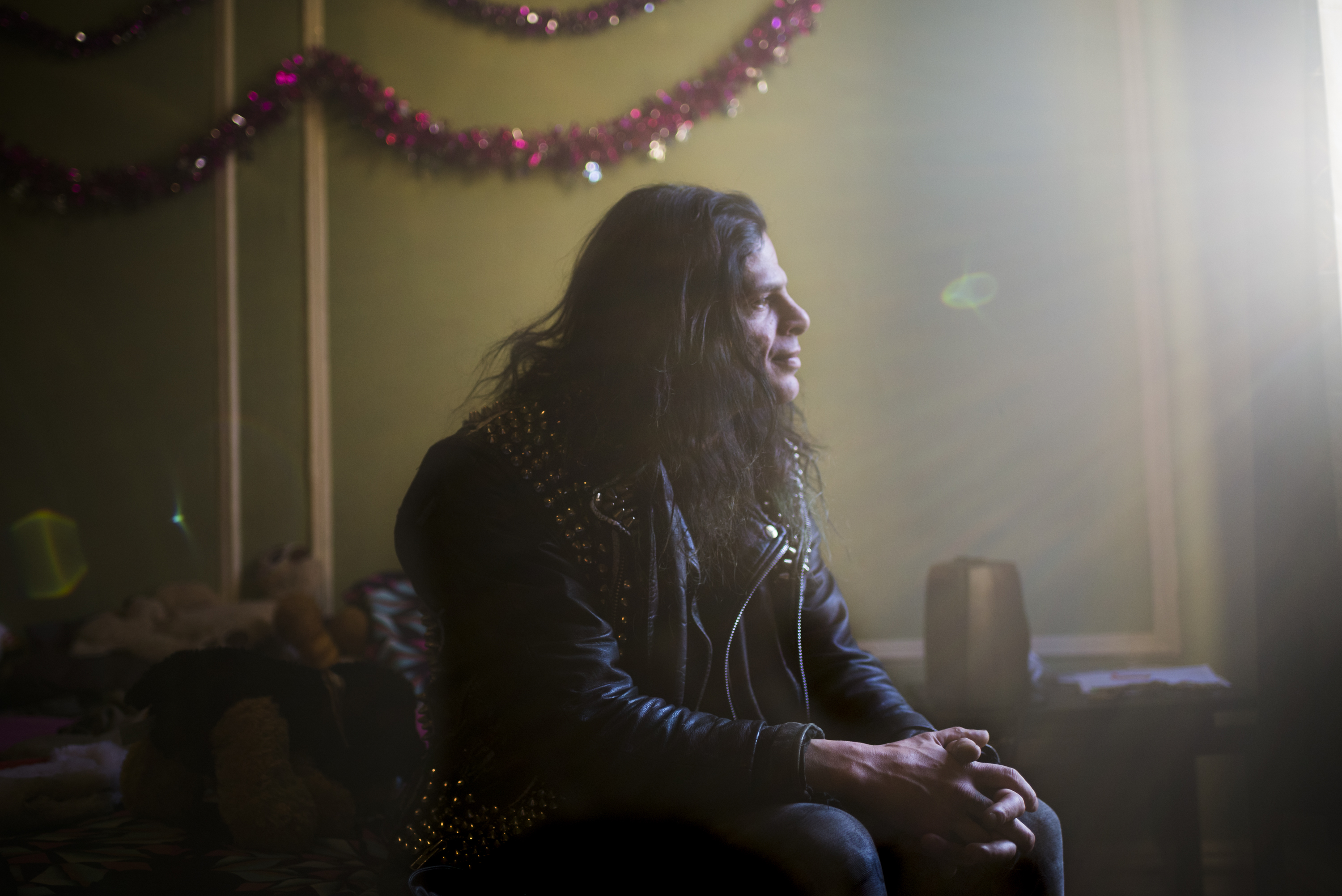 Scott Newman, 48, poses for a portrait in his bedroom in Brooklyn, N.Y. on Dec. 22, 2016. ÒThis is a christmas miracle, I never thought this day would come,Ó said Newman after having met his biological daughter for the first time since she was born. Newman has been in and out of rehabilitation centers for alcoholism for the past twenty years. He currently works as a hairdresser and is lead vocalist in his  punk band Skitzopolis.