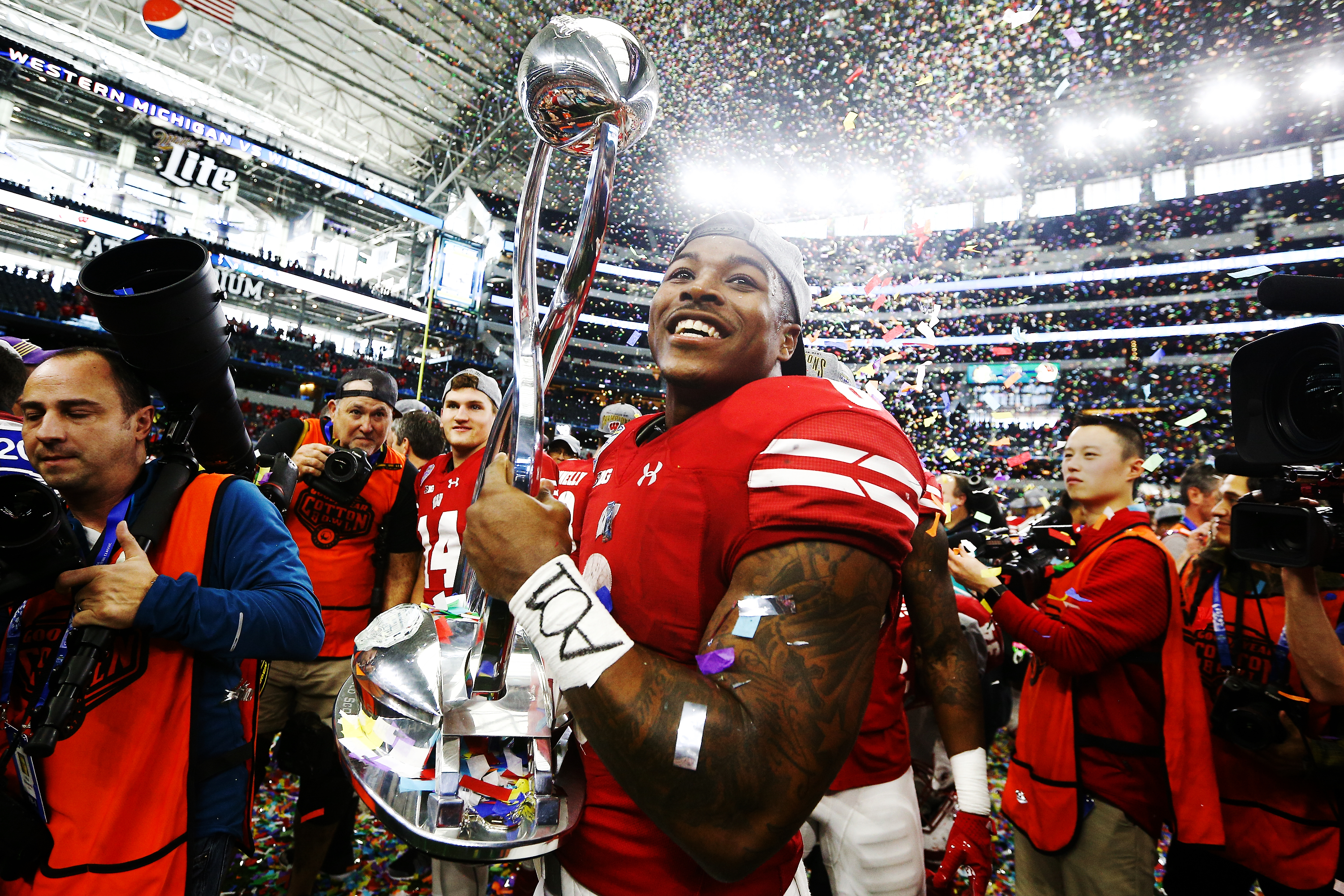 Wisconsin Badgers running back Corey Clement (6) holds the Cotton Bowl trophy after defeating Western Michigan 24-16 in the 81st Annual Goodyear Cotton Bowl Classic between Western Michigan and Wisconsin at AT&T Stadium in Arlington, TX on January 2, 2017.